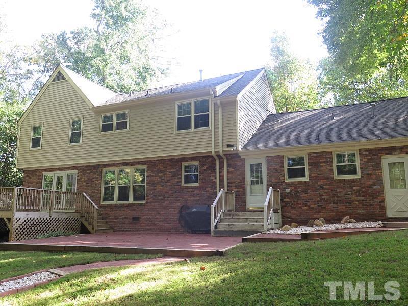 1317 Ravenhurst Drive Raleigh, NC 27615 - Photo 22 of 23 a front view of a house with a yard