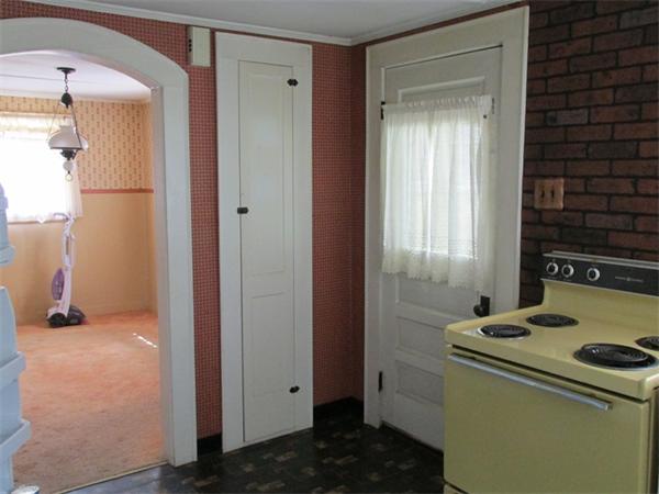 6 Burrows Turnpike Road Bernardston, MA 01337 - Photo 5 of 25 a room that has a door and a table in it