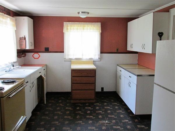 6 Burrows Turnpike Road Bernardston, MA 01337 - Photo 7 of 25 a utility room with cabinets washer and dryer