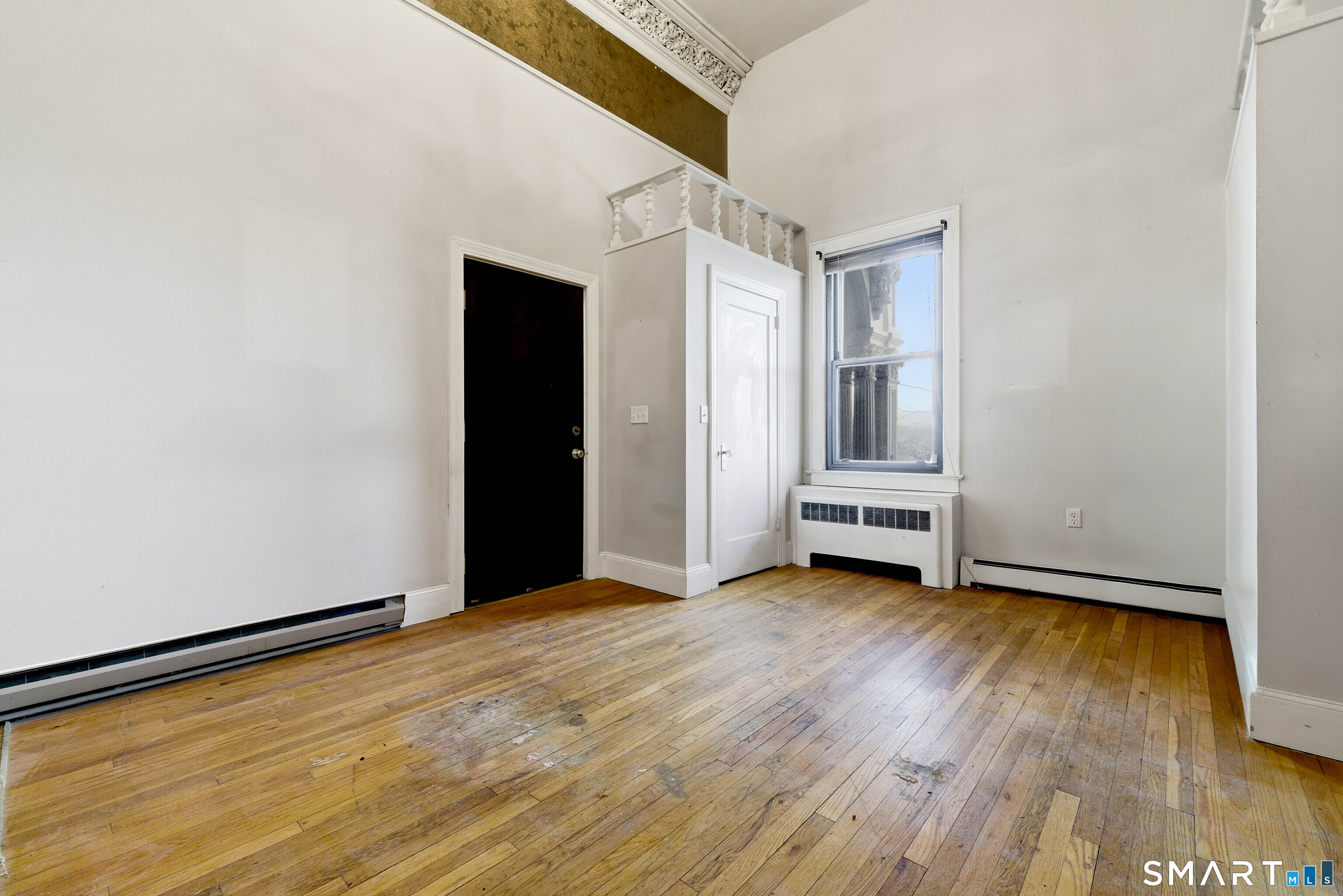 26 Greene Avenue, Unit A2 Norwich, CT 06360 - Photo 4 of 14 a view of empty room with wooden floor