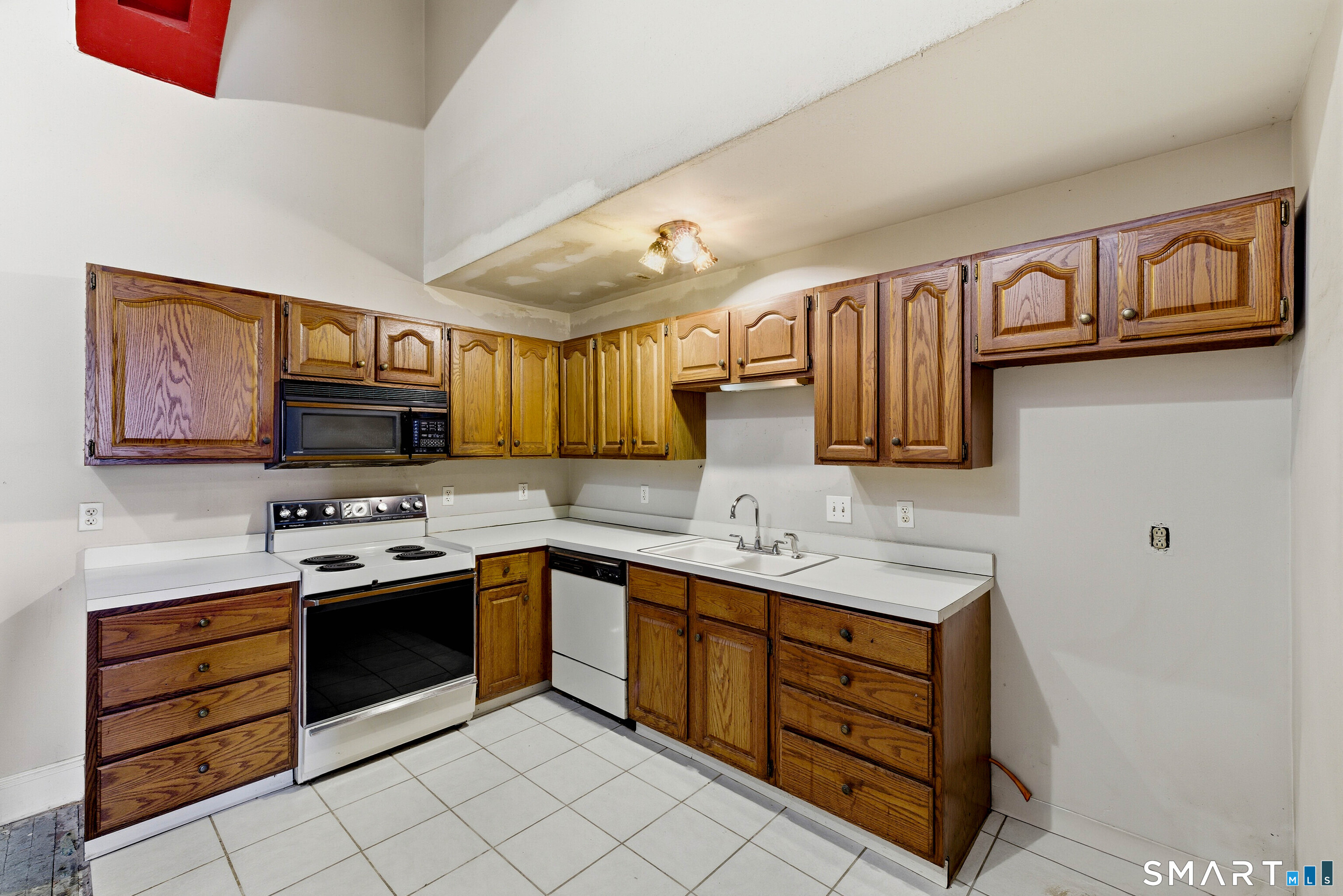 26 Greene Avenue, Unit A2 Norwich, CT 06360 - Photo 6 of 14 a kitchen with stainless steel appliances granite countertop a stove and a sink