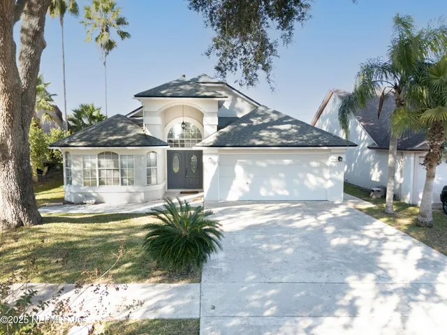 a view of swimming pool with a yard