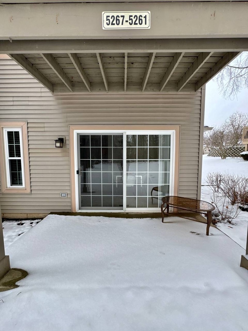 5261 Pebble Lane Crystal Lake, IL 60012 - Photo 20 of 21 a front view of a house with a large window