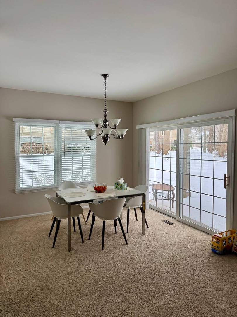 5261 Pebble Lane Crystal Lake, IL 60012 - Photo 10 of 21 a view of a livingroom with furniture and window
