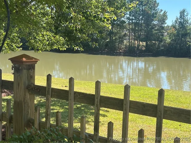 a view of swimming pool from a balcony
