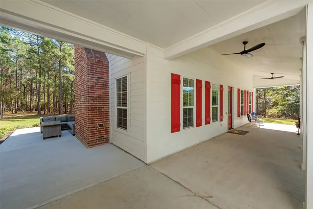a view of livingroom with furniture and floor to ceiling window