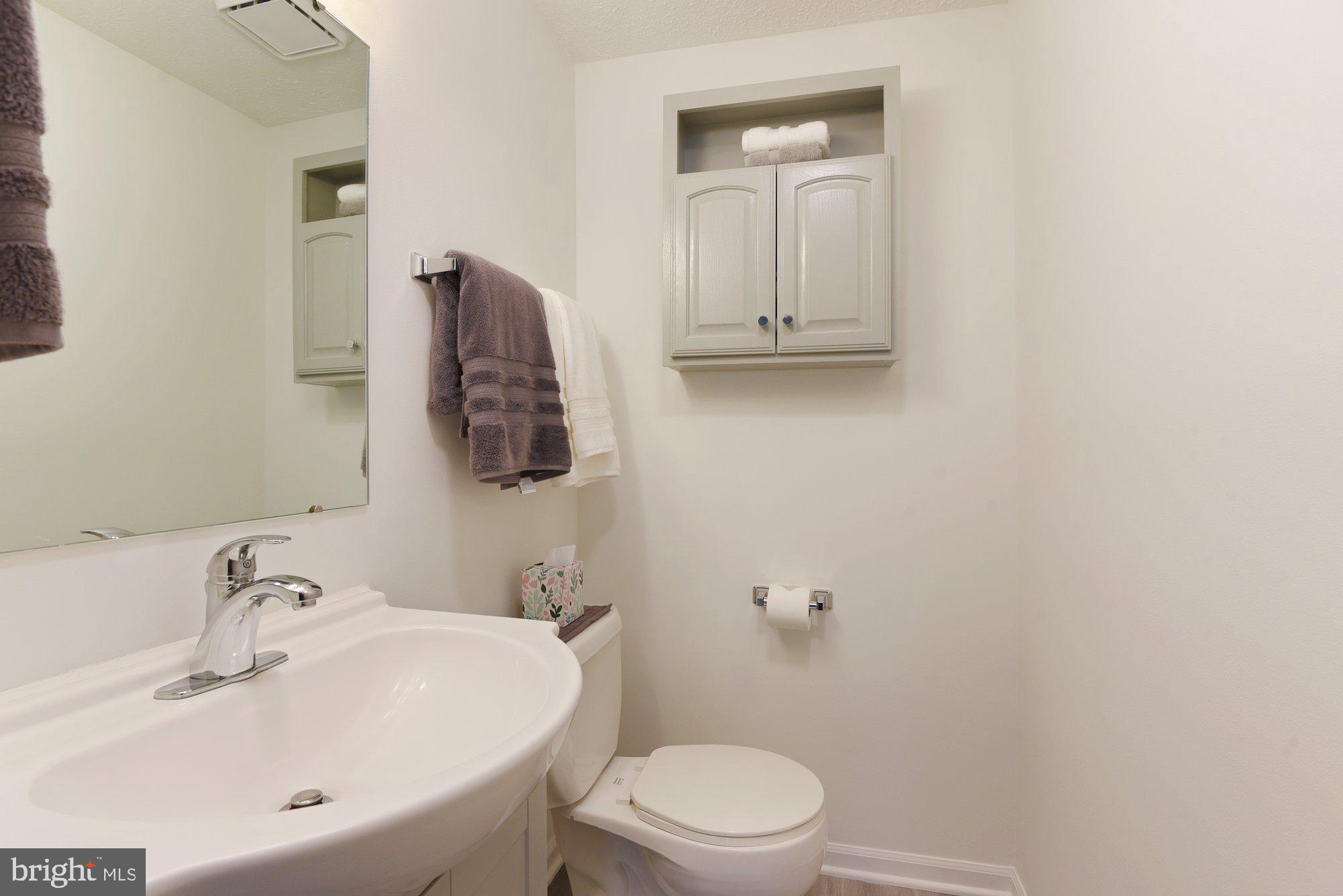 586 Cascade Way Frederick, MD 21703 - Photo 7 of 29 First-level half bathroom
