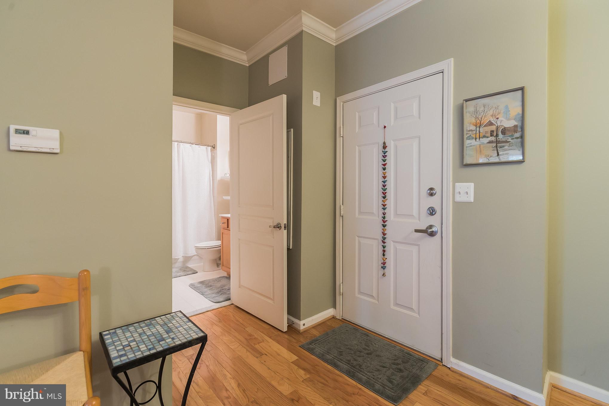 12001 Market Street, Unit 152 Reston, VA 20190 - Photo 23 of 30 Unseen here - closet is just before bathroom entry