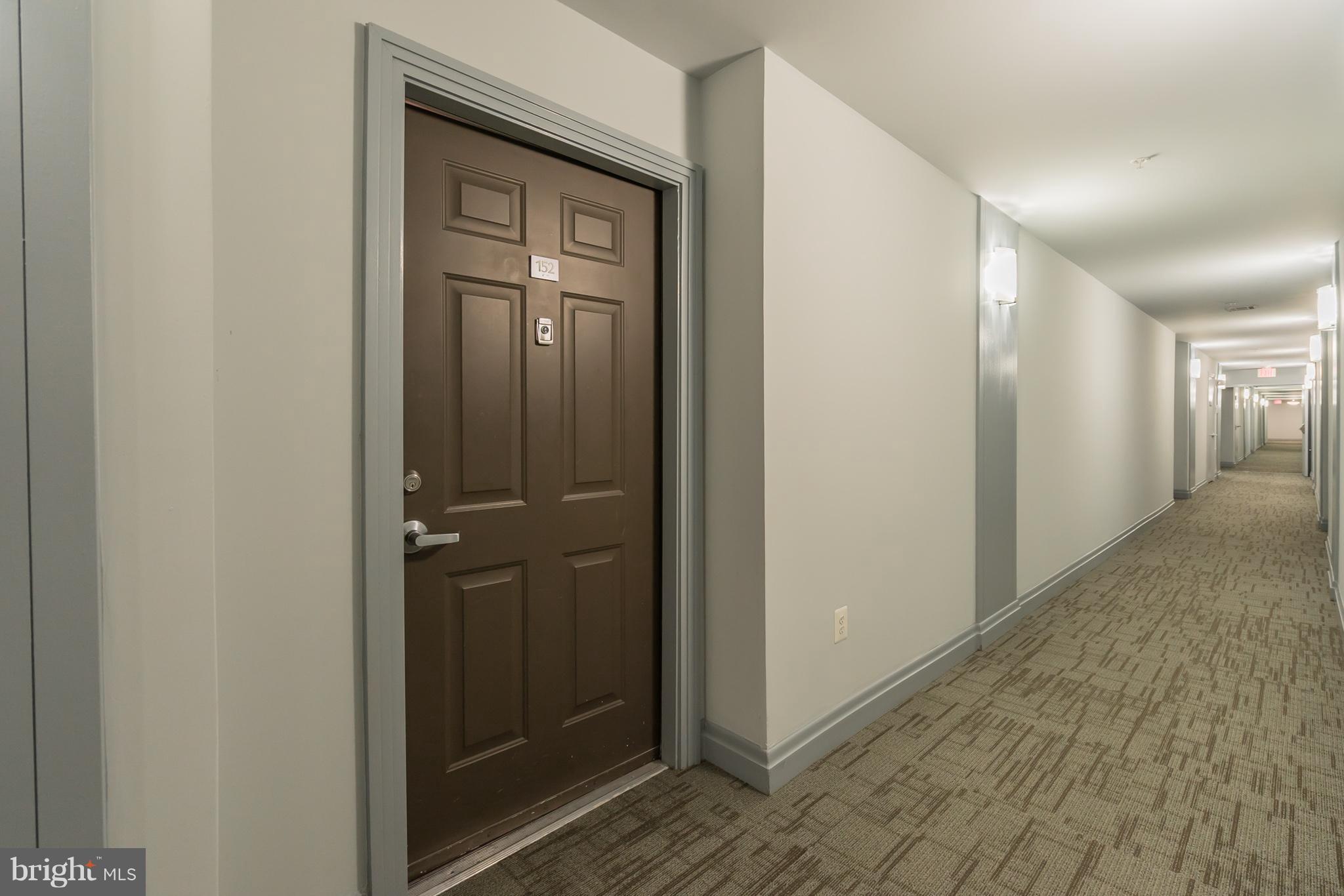 12001 Market Street, Unit 152 Reston, VA 20190 - Photo 27 of 30 Elevator from Garage is Close By*TWO GARAGE SPOTS!