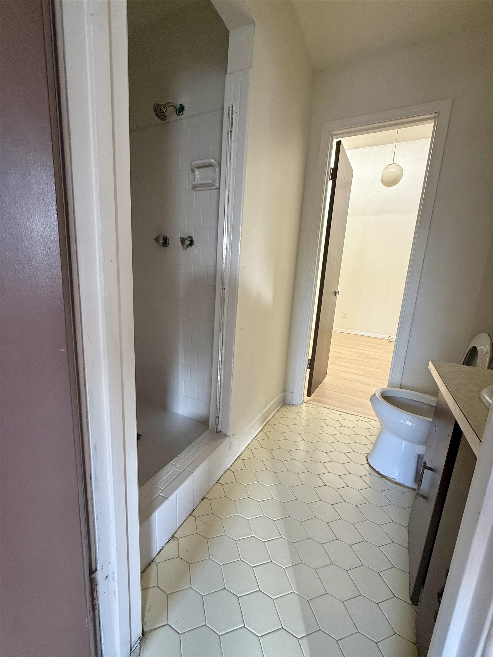 3091 Range Line Road Memphis, TN 38127 - Photo 10 of 13 Bathroom with vanity, a shower stall, and light tile patterned flooring