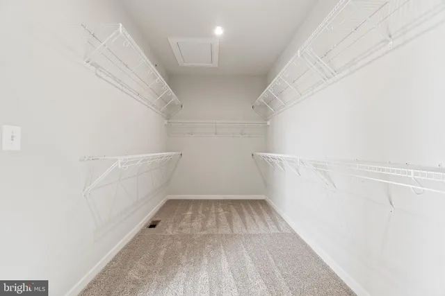 a view of small space with racks on the wall