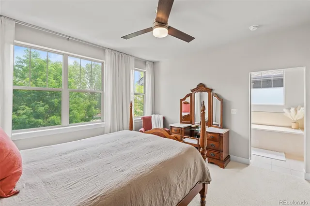 a bedroom with a bed furniture and a window