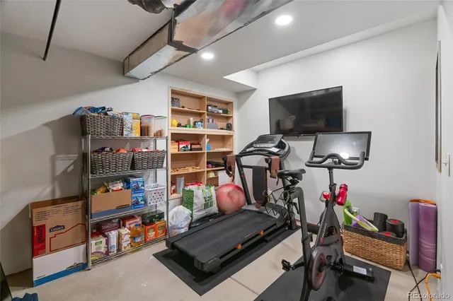 a room with furniture and a flat screen tv