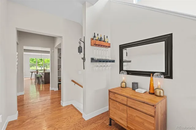 a bathroom with a sink mirror and vanity