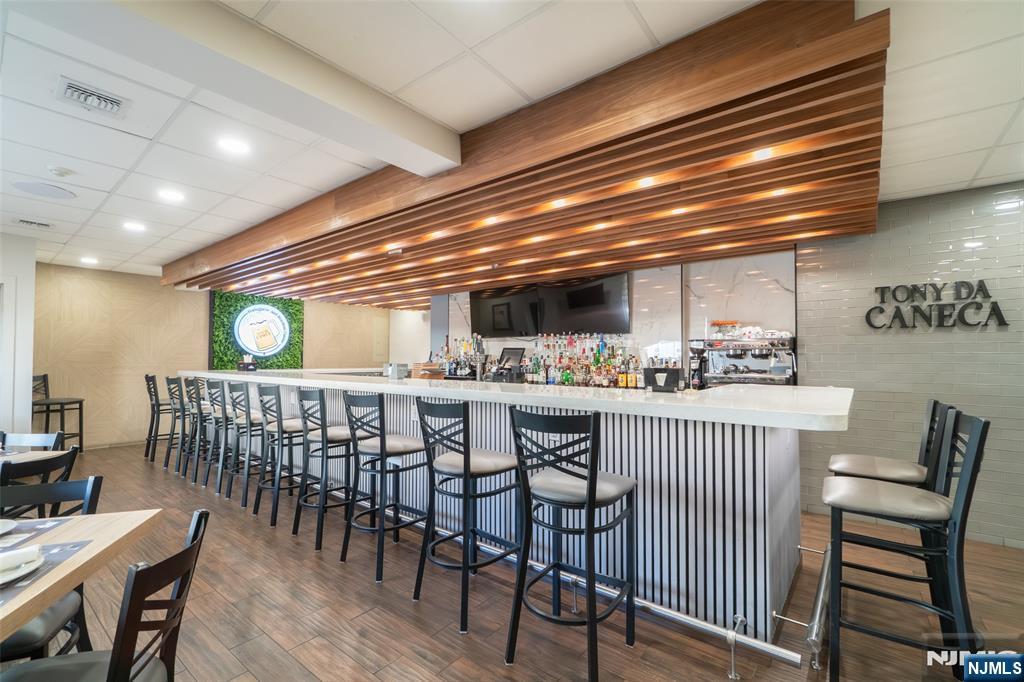 72-74 Elm Road Newark, NJ 07105 - Photo 14 of 41 a dining room with furniture and window