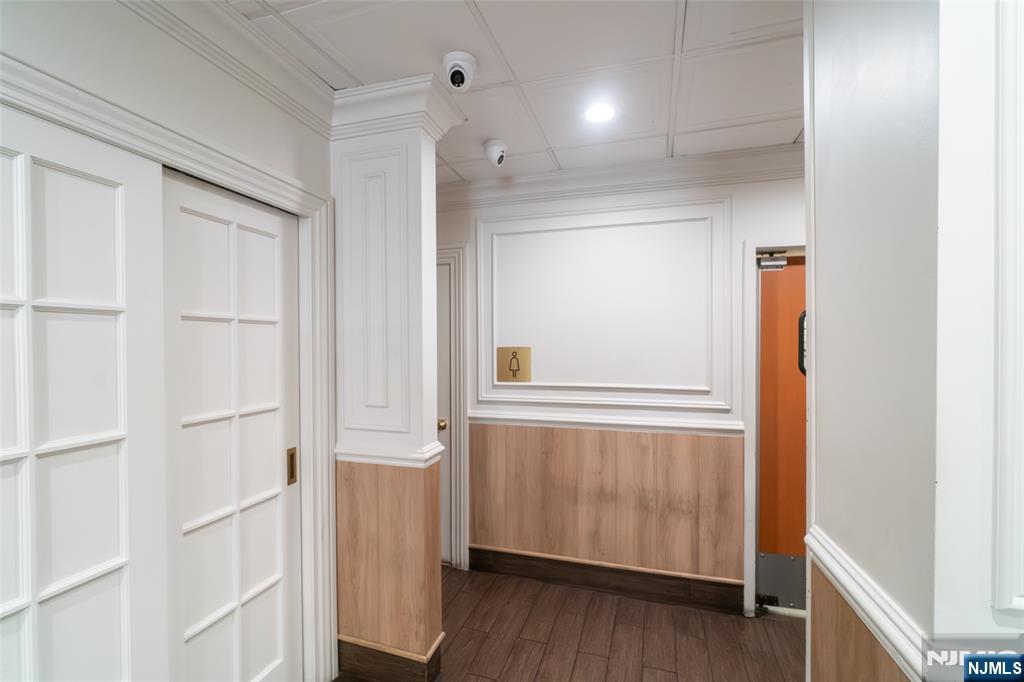 72-74 Elm Road Newark, NJ 07105 - Photo 17 of 41 a view of a hallway with wooden floor