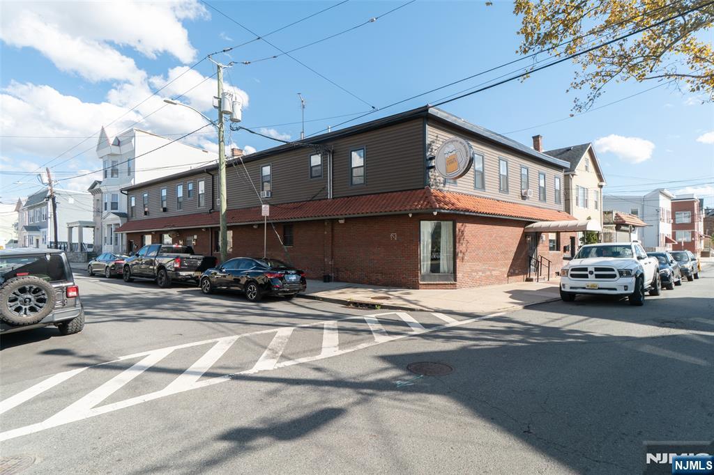 72-74 Elm Road Newark, NJ 07105 - Photo 2 of 41 a view of a car park the street