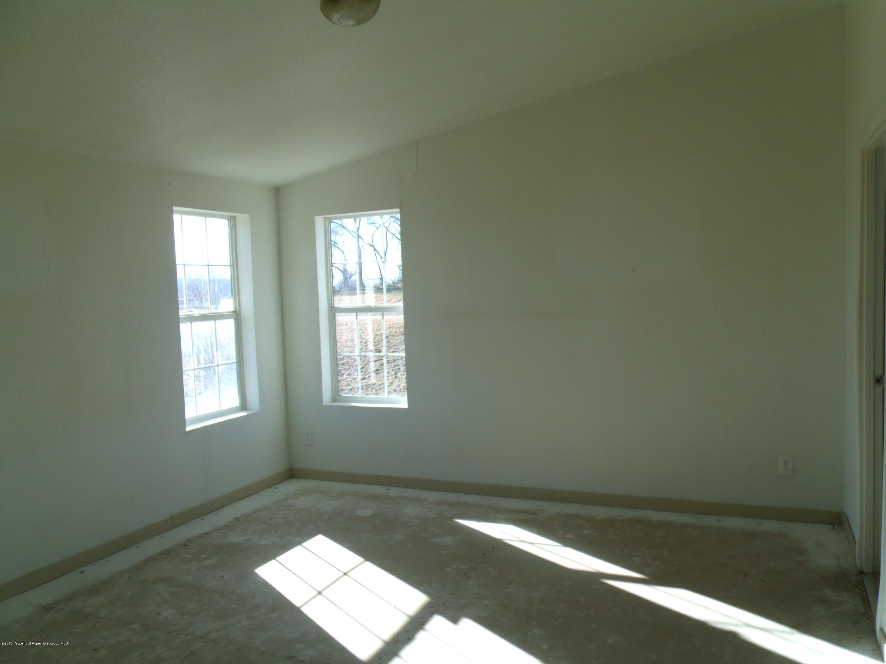 266 Fox Run Road Rifle, CO 81650 - Photo 7 of 13 a view of an empty room and window