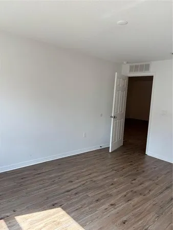 a view of an empty walk in closet