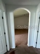 an empty room with a door