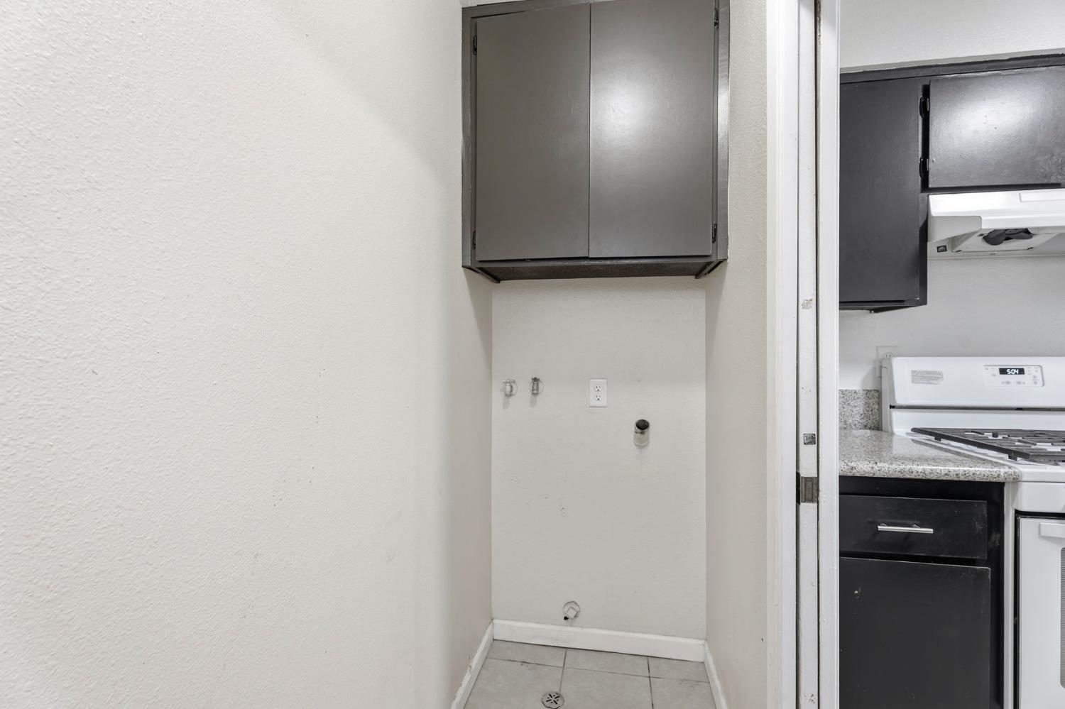 237 East Modoc Avenue Visalia, CA 93291 - Photo 16 of 31 a view of a kitchen from the hallway