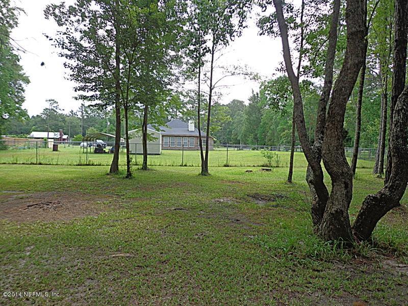 54399 Church Road Callahan, FL 32011 - Photo 13 of 49 a view of a park with large trees