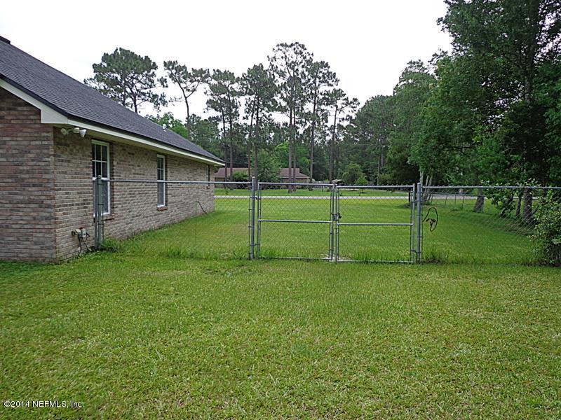 54399 Church Road Callahan, FL 32011 - Photo 17 of 49 a view of a back yard