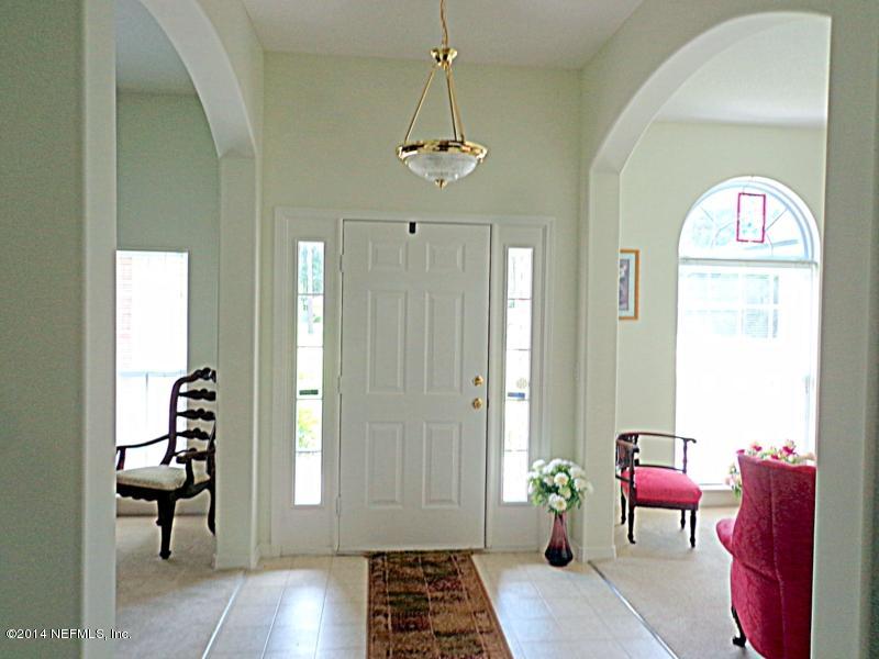 54399 Church Road Callahan, FL 32011 - Photo 21 of 49 a view of a room with furniture and a window