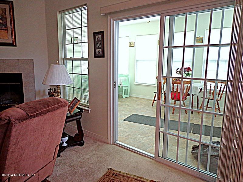 54399 Church Road Callahan, FL 32011 - Photo 31 of 49 a view of a livingroom with furniture and a window