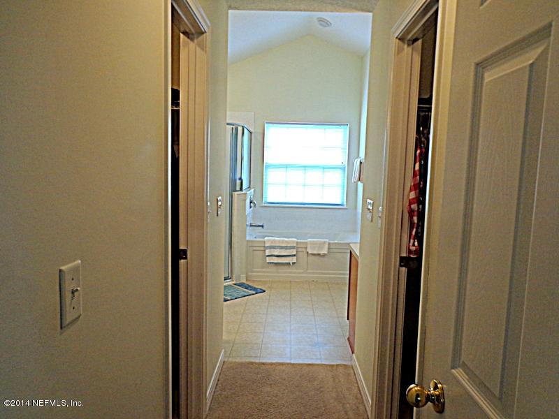 54399 Church Road Callahan, FL 32011 - Photo 39 of 49 a view of a bathroom from a hallway