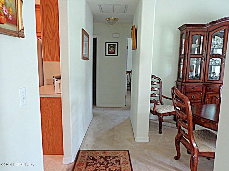 54399 Church Road Callahan, FL 32011 - Photo 44 of 49 a view of hallway with furniture and a window