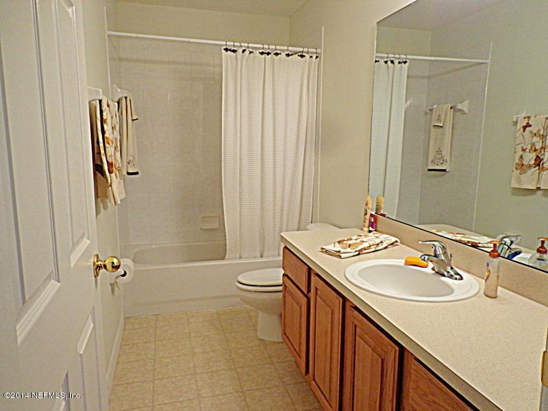 54399 Church Road Callahan, FL 32011 - Photo 46 of 49 a bathroom with a sink toilet and shower