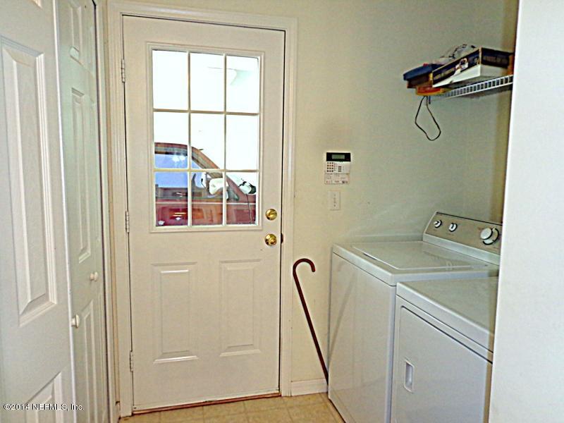 54399 Church Road Callahan, FL 32011 - Photo 49 of 49 a utility room with a shower and mirror