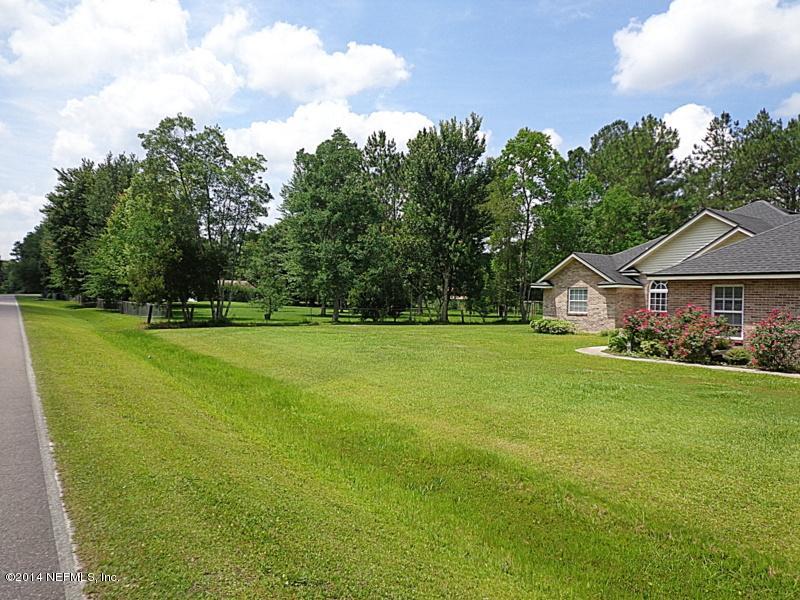 54399 Church Road Callahan, FL 32011 - Photo 5 of 49 a front view of house with yard and green space