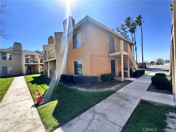 a view of a house with backyard and a slide