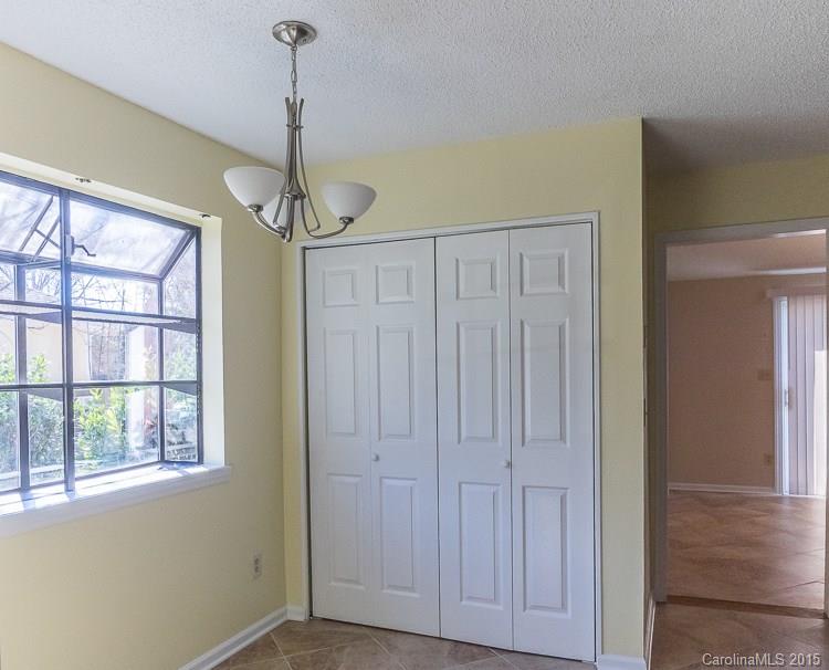 9712 Fairway Ridge Road Charlotte, NC 28277 - Photo 7 of 12 a view interior of a house and wooden floor windows