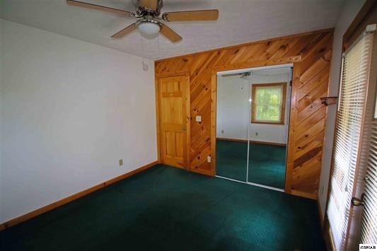 1045 Bryan View Road Sevierville, TN 37862 - Photo 11 of 21 an empty room with a ceiling fan and window