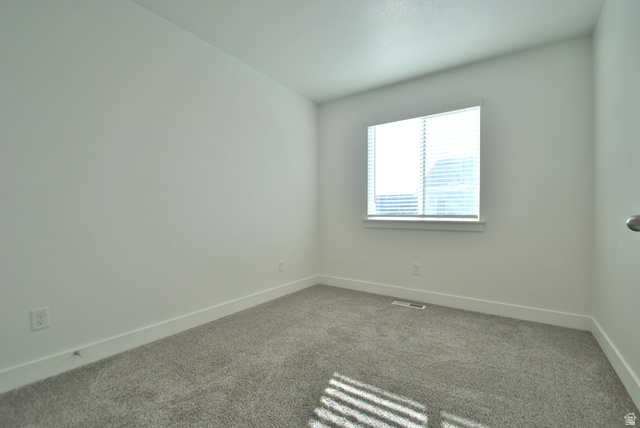 1219 West 1870 South Logan, UT 84321 - Photo 12 of 18 Bedroom featuring carpet flooring and baseboards