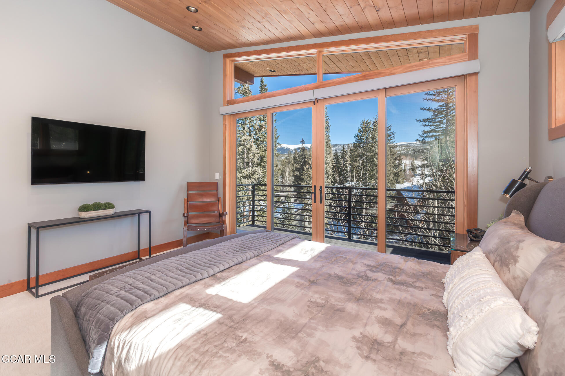 684 Vasquez Road Winter Park, CO 80482 - Photo 20 of 45 a bedroom with a bed and a television