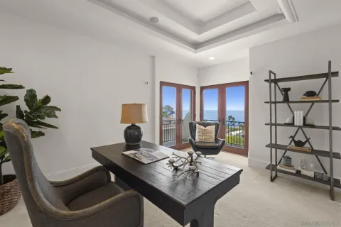 a view of a workspace with furniture