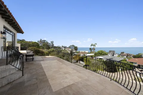 a view of a terrace with furniture
