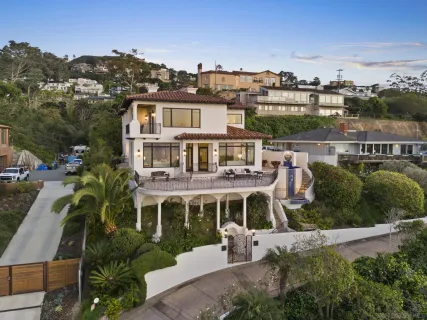 an aerial view of a house with a garden view