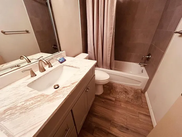 a bathroom with a sink and a toilet
