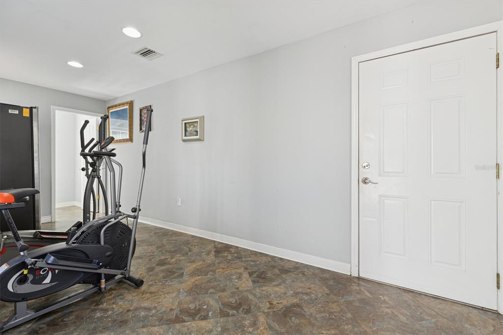 16607 Bearle Road Orlando, FL 32828 - Photo 51 of 57 a view of a room with gym equipment