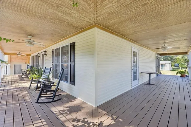 a view of a porch with furniture