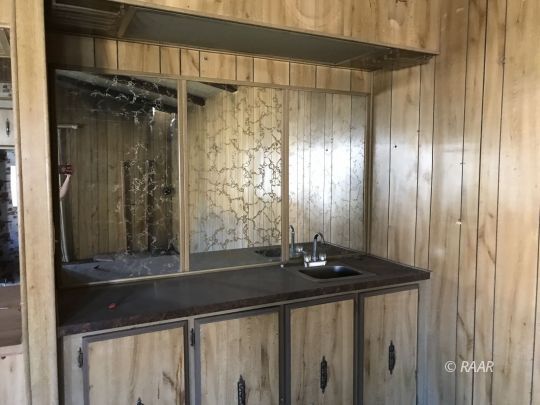 5690 South Kelso Valley Road Weldon, CA 93283 - Photo 7 of 17 a bathroom with a sink and a mirror