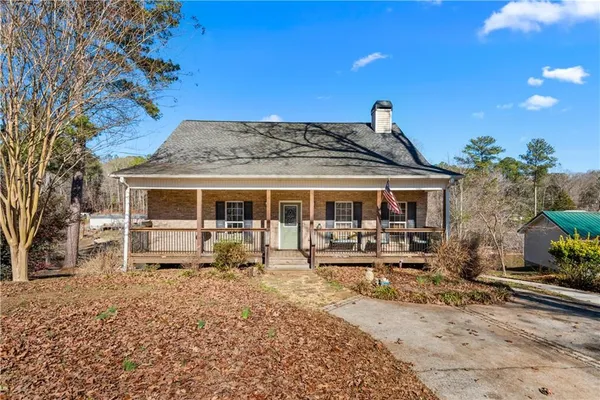 a front view of a house with patio