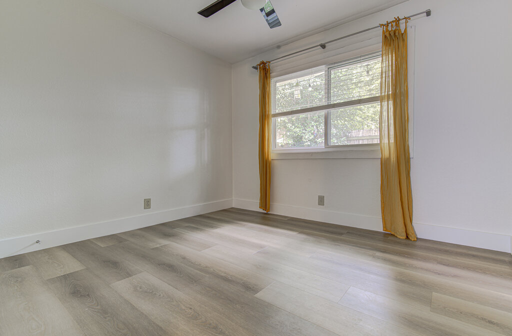 6713 West Gate Boulevard, Unit A Austin, TX 78745 - Photo 12 of 21 an empty room with window