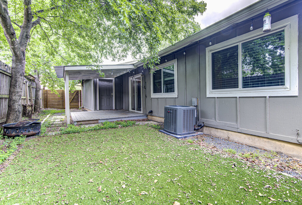 6713 West Gate Boulevard, Unit A Austin, TX 78745 - Photo 21 of 21 a view of a house with backyard and porch