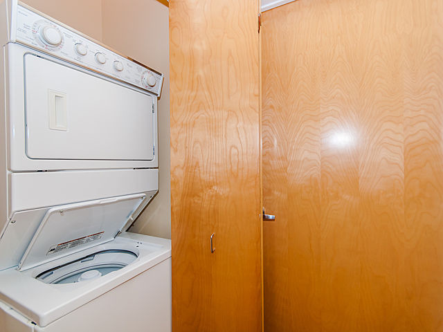 321 South Sangamon Street, Unit 901 Chicago, IL 60607 - Photo 17 of 18 a bathroom with a sink a toilet and a mirror